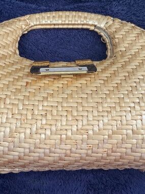 VINTAGE  CLUTCH , WOVEN WITH BAMBOO LIKE MATERIAL .  MADE IN CHINA